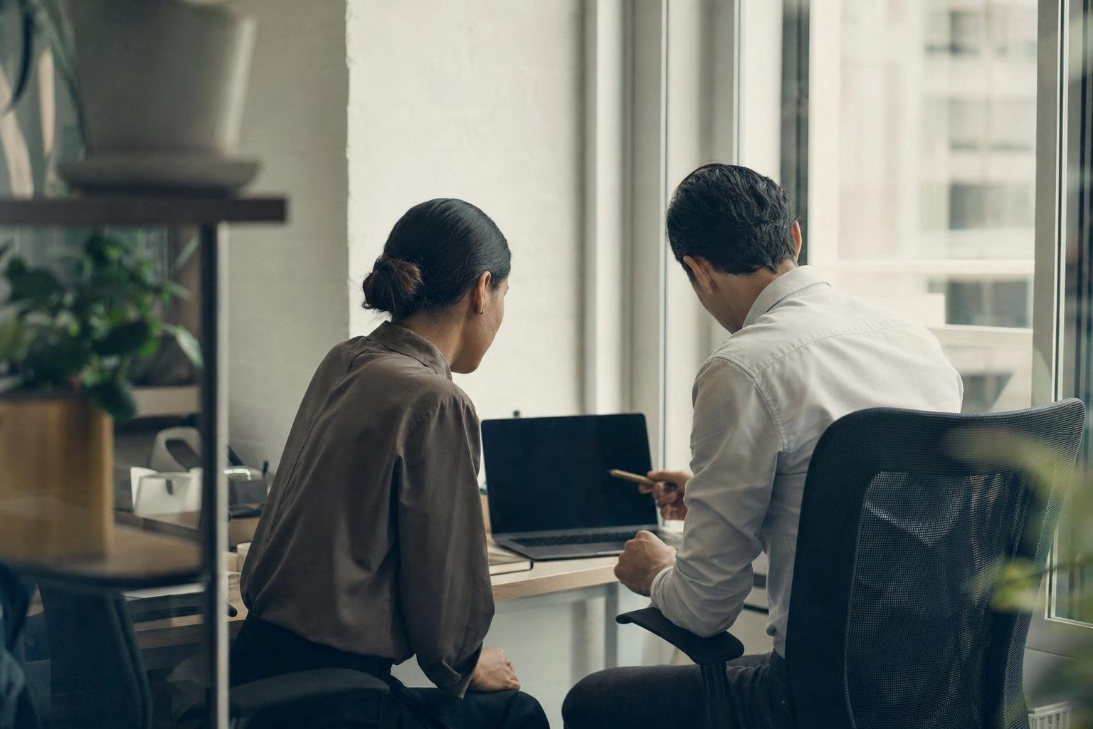 Team collaborating at a desk